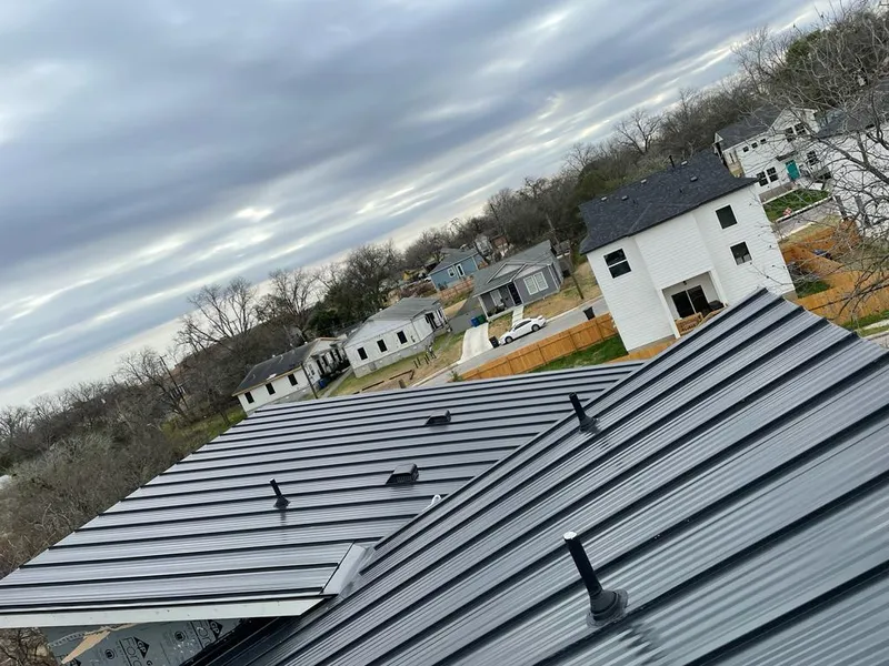 Standing seam metal roof panels with vents for Skylight Repair in Avondale
